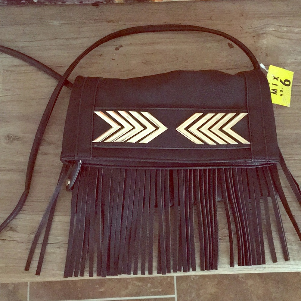 Black fringe party purse.  Strap is cross body